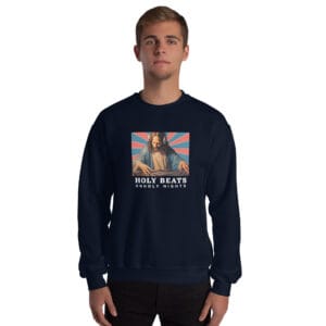 DJ Jesus on decks Christmas jumper with Holy Beats text